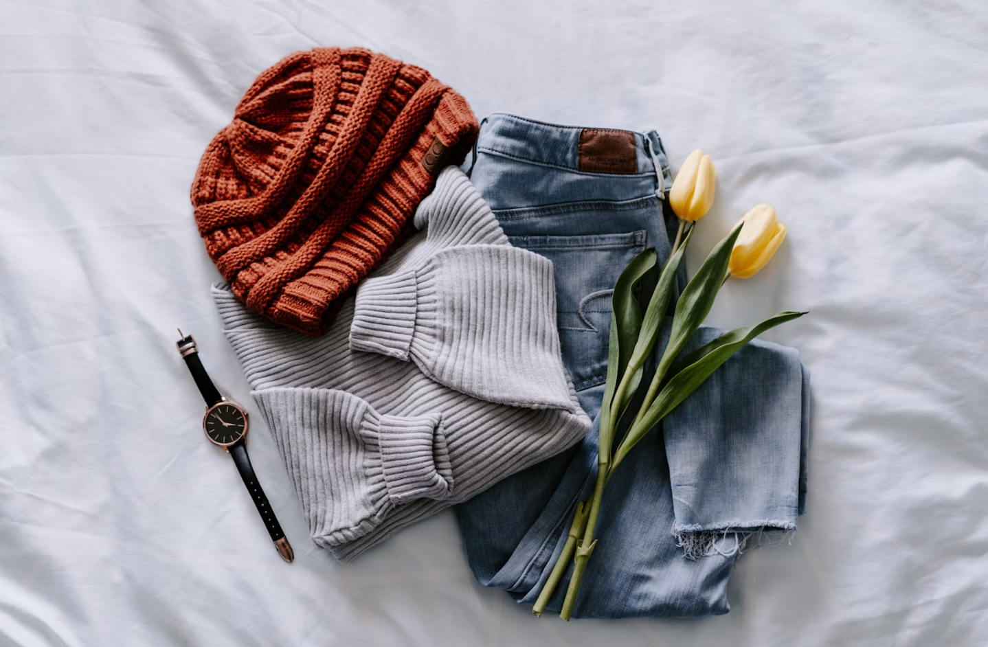 Tennis player laying on the court